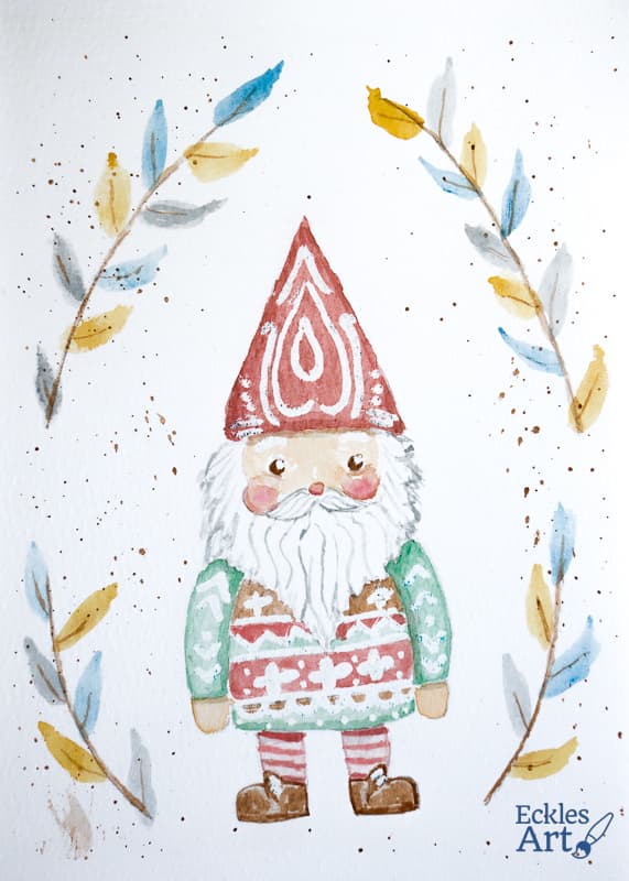 A folk art-inspired Santa Claus, designed with a charming, handcrafted aesthetic. Santa has a warm, rosy-cheeked face with a flowing white beard and a sharply pointed red hat, evoking a nostalgic, vintage feel. His outfit includes traditional red, white, and green elements, adorned with patterned, embroidery-like details that are common in folk art. The illustration is flanked by a leafy arched motif, adding to the cozy, handcrafted vibe. The color palette is warm and earthy, incorporating deep reds, soft creams, and muted greens for a classic yet artistic holiday feel.