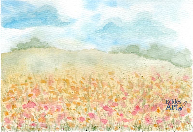 A serene wildflower field. The foreground is filled with loosely painted pink and orange flowers scattered among green grasses, creating a soft and natural texture. The middle ground features rolling golden hills that blend seamlessly into the background. In the distance, faint green trees add depth to the scene. The sky is a mix of soft blue and white with wispy clouds drifting across.