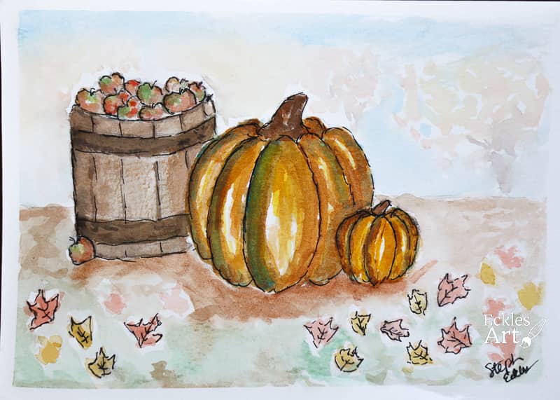 The subjects of this scene are a classic wooden barrel overfilled with apples next to one large and one small pumpkin. An apple has spilled out of the basket. The ground has soft hints of autumn leaves as well as some with inked outlines to emphasize their shape. Just visble in the background is the hint of out-of-focus leafy trees with fall-turned leaves in yellow, orange, and red.